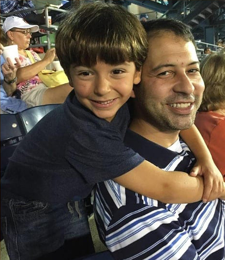 Matt and son at ballgame